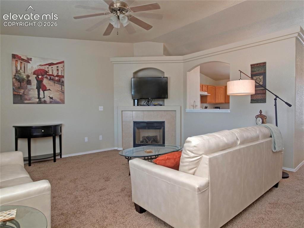 Image 4 of 18: Gas fireplace and TV nook
