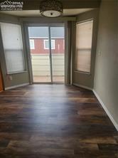 Image 9 of 18: New LVP flooring in kitchen and baths-walk out balcony