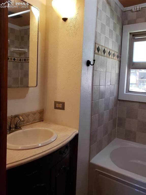 Image 13 of 20: Bathroom with vanity