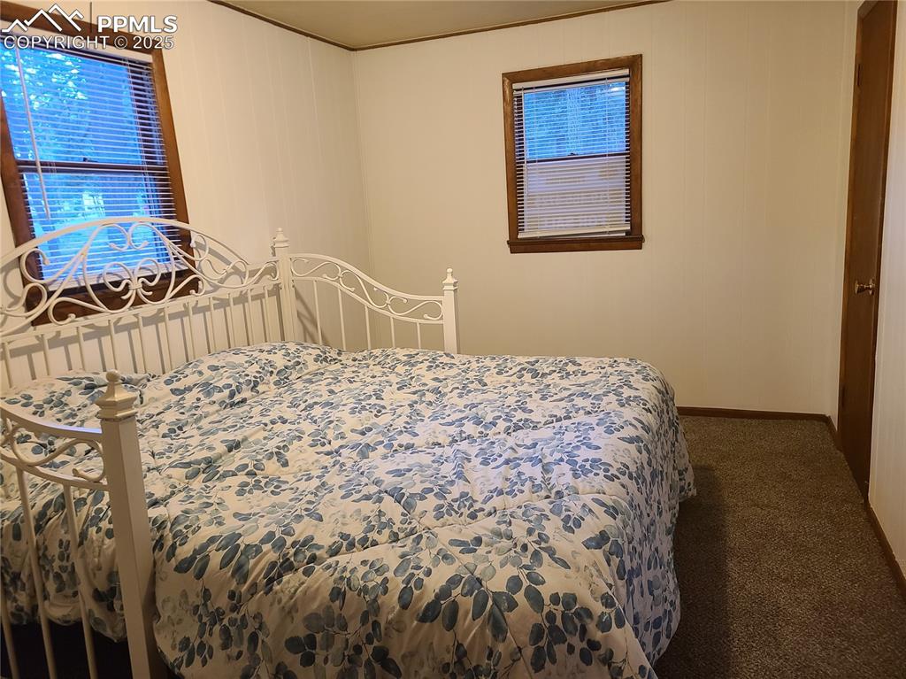 Image 20 of 20: Carpeted bedroom featuring baseboards