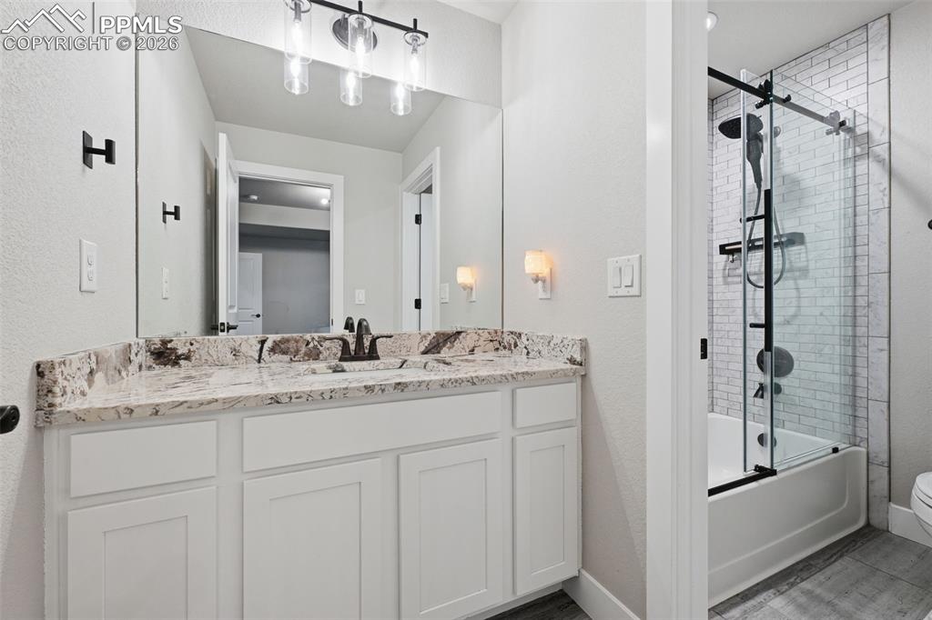 Image 31 of 36: Off basement bedroom