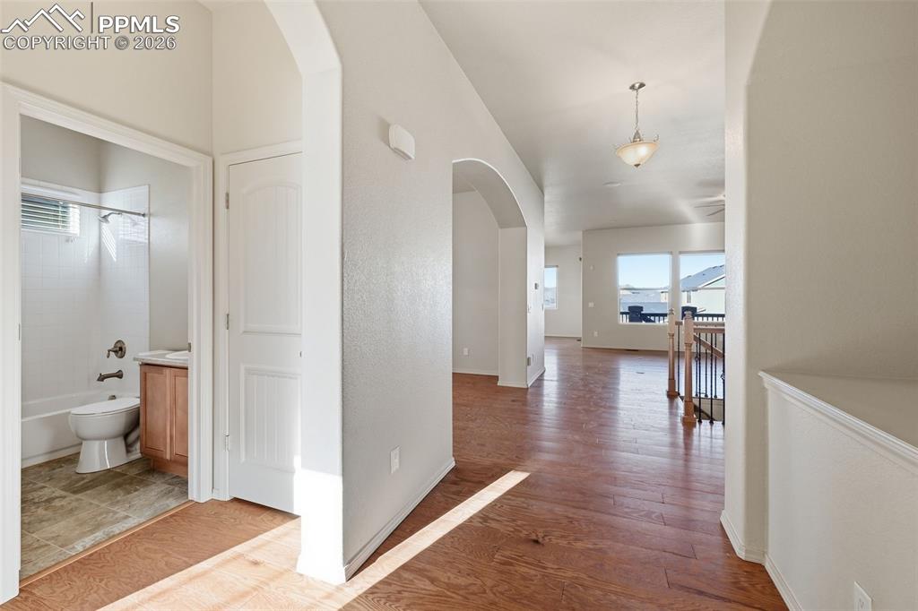 Image 3 of 42: Entryway with built-in