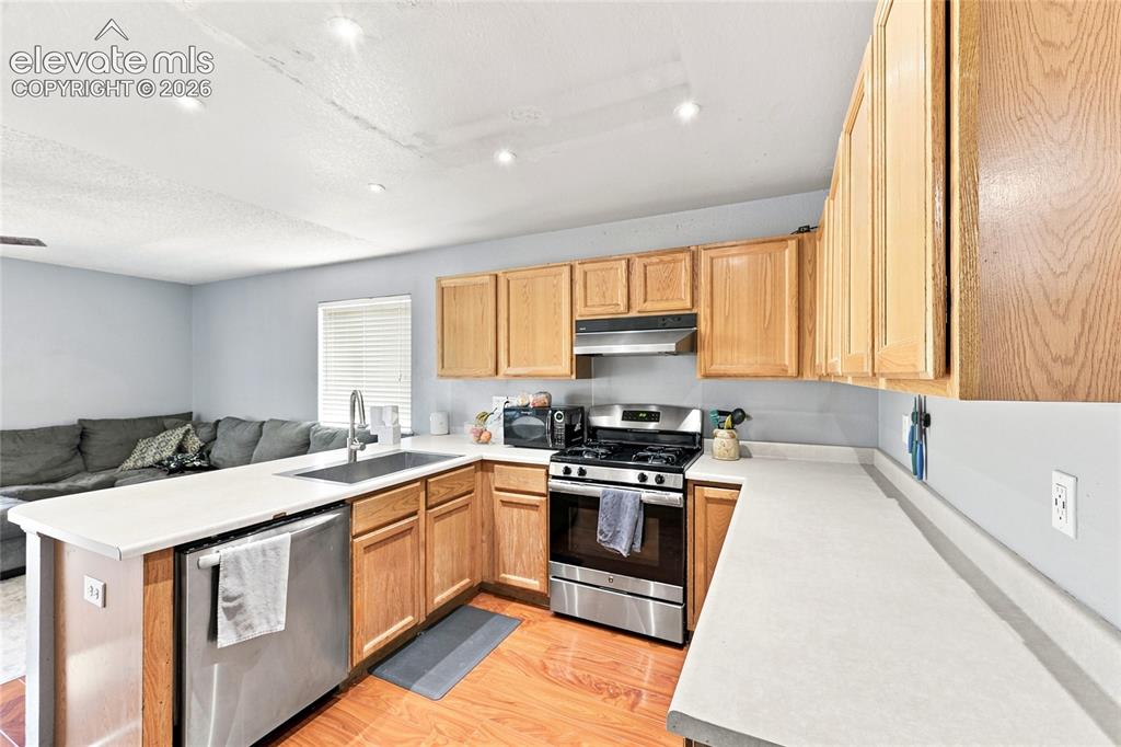 Image 10 of 27: Open kitchen