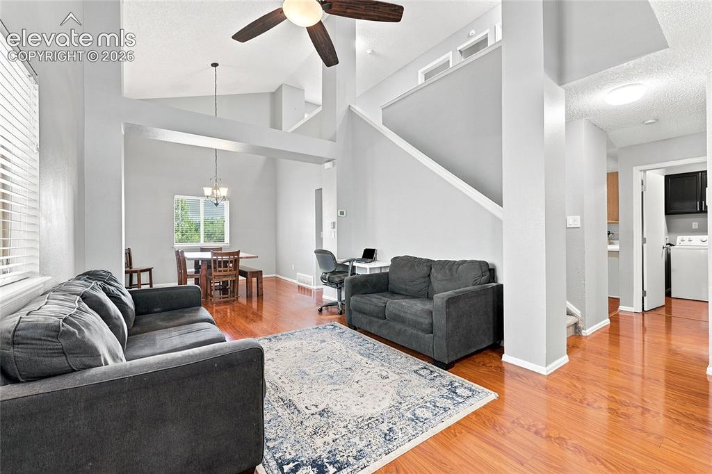 Image 4 of 27: Family Room with Vaulted Ceiling