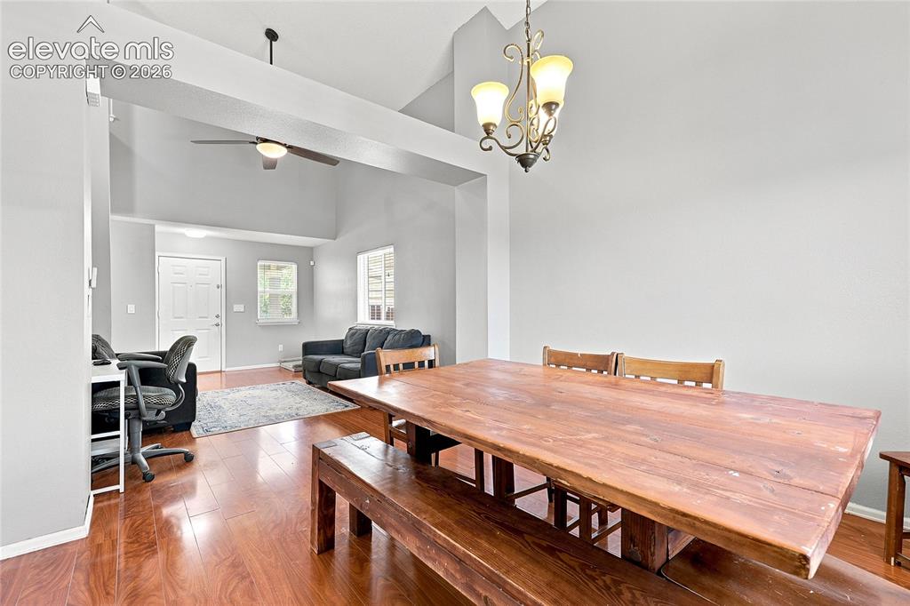 Image 6 of 27: Formal Dining Room with Vaulted Ceiling