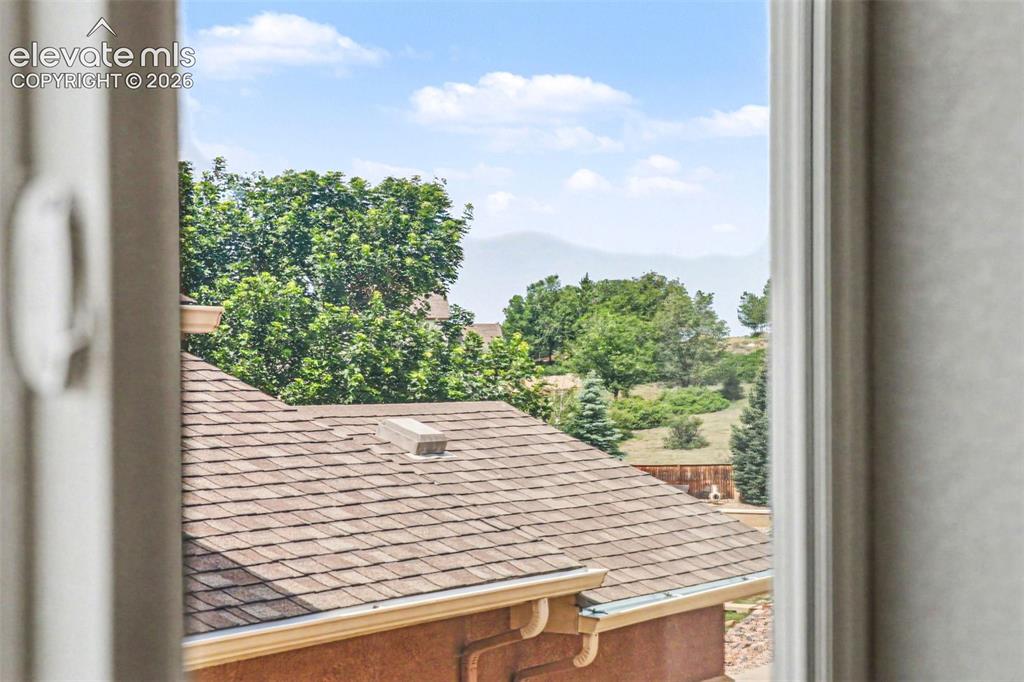 Image 17 of 34: View of Pikes Peak from dining room