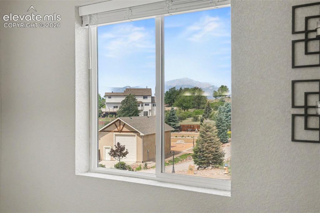 Image 18 of 34: View of Pikes Peak from entry window