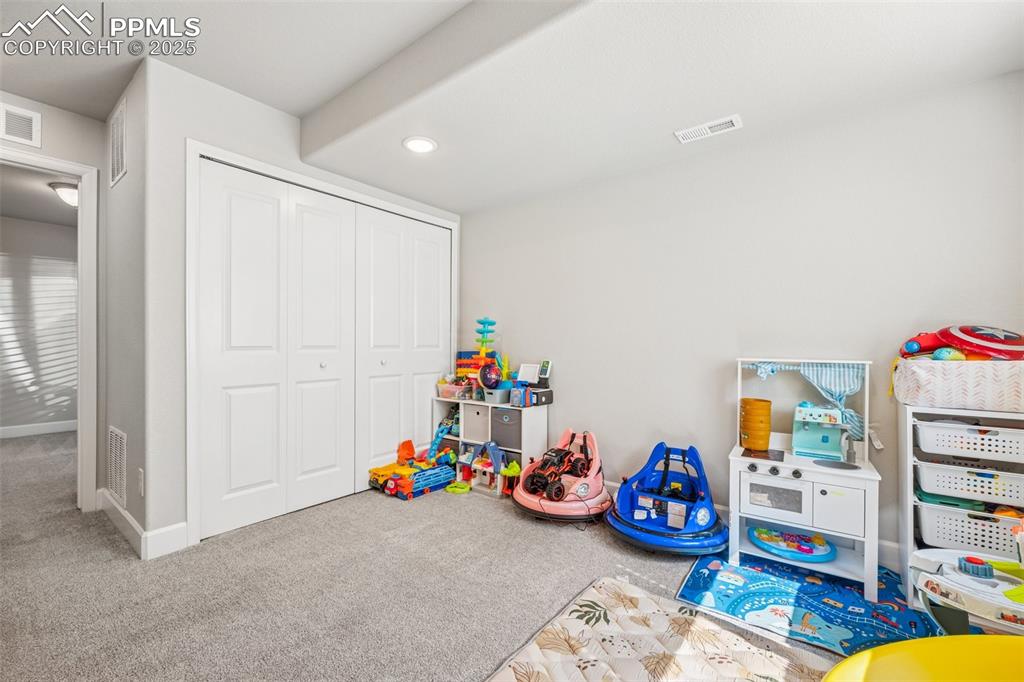 Image 24 of 30: Basement Family Room