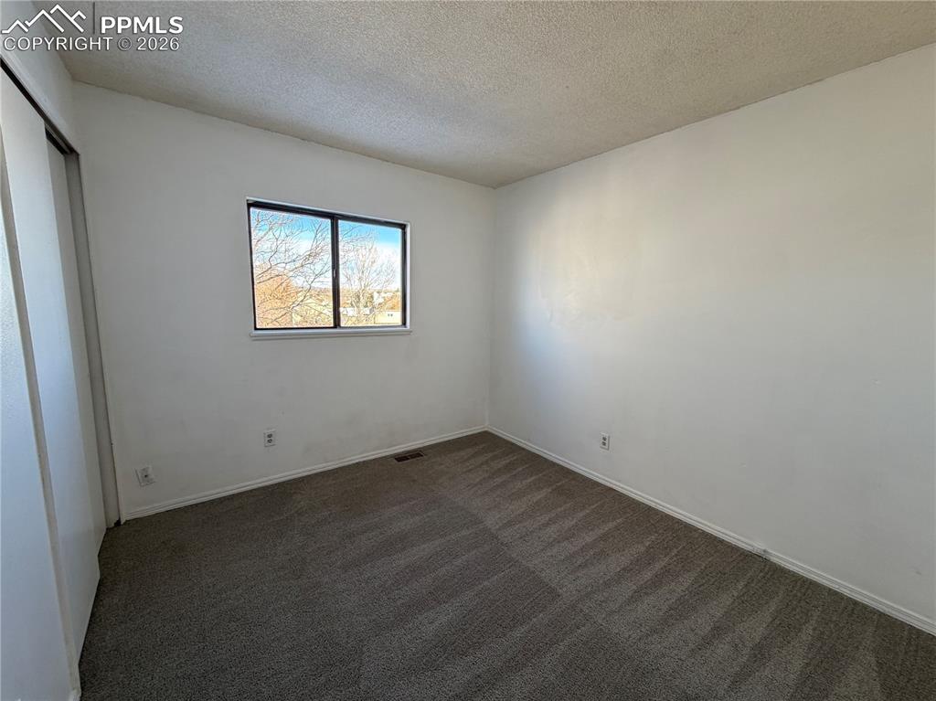 Image 20 of 26: Bedroom