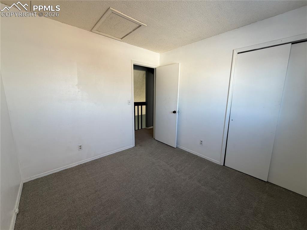 Image 21 of 26: Bedroom