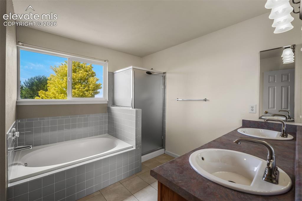 Image 29 of 46: Soaking Tub In Primary Bathroom 