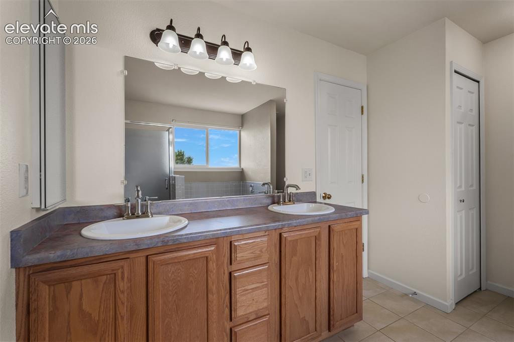 Image 32 of 46: Primary Bath With Double Vanities