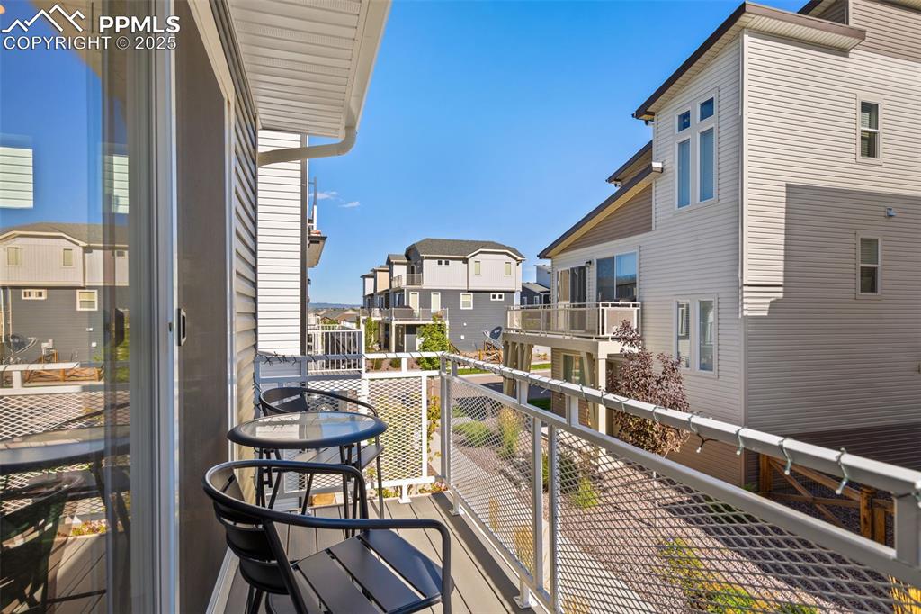 Image 12 of 15: Deck with some distant views of front range mountain tops