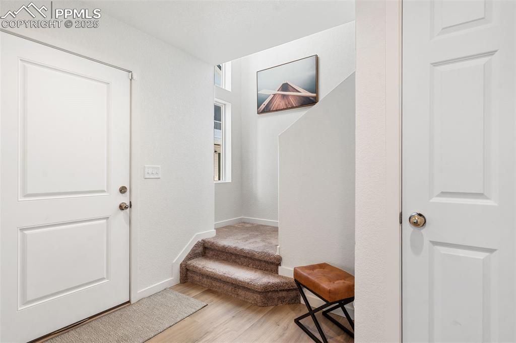 Image 2 of 15: Enty level and flex room 