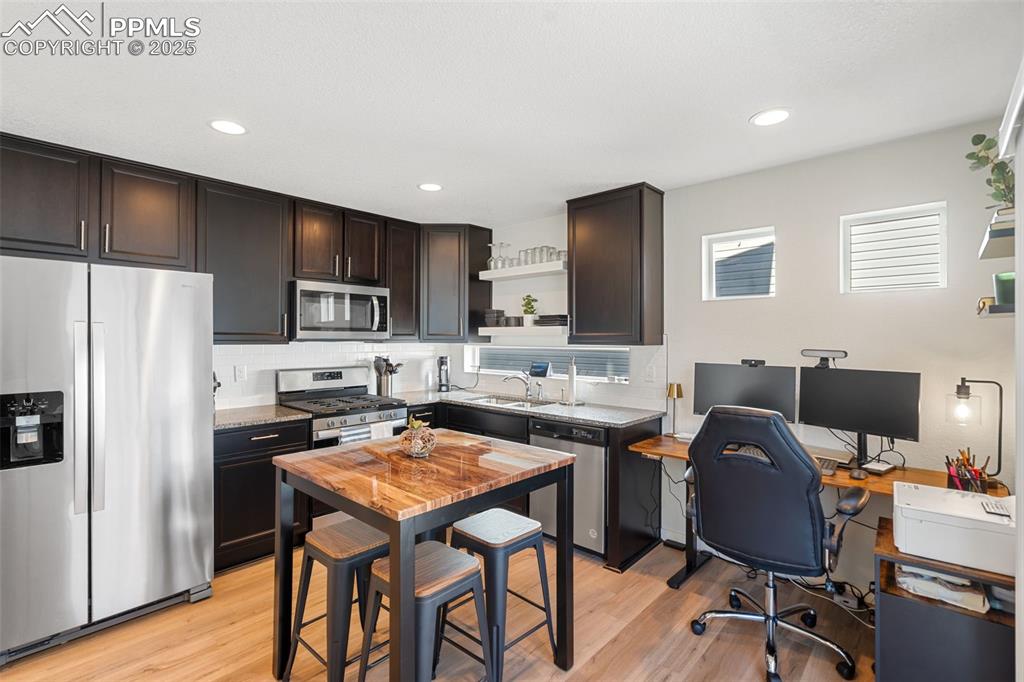 Image 3 of 15: upgraded cabinets, gas range, refrigerator