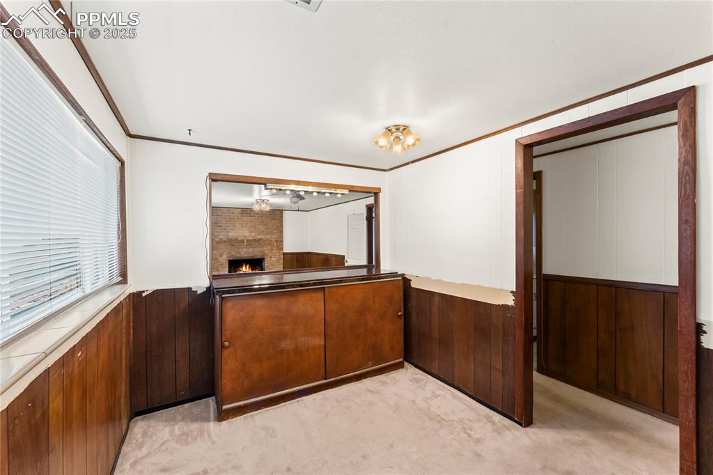 Image 22 of 39: Bar area in basement 