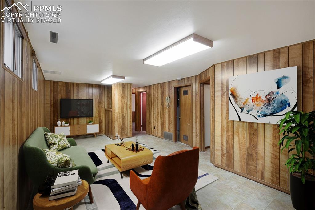 Image 22 of 42: Virtually staged family room in basement