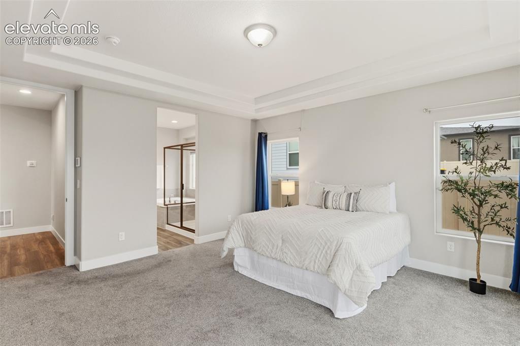 Image 18 of 34: Master Bedroom
