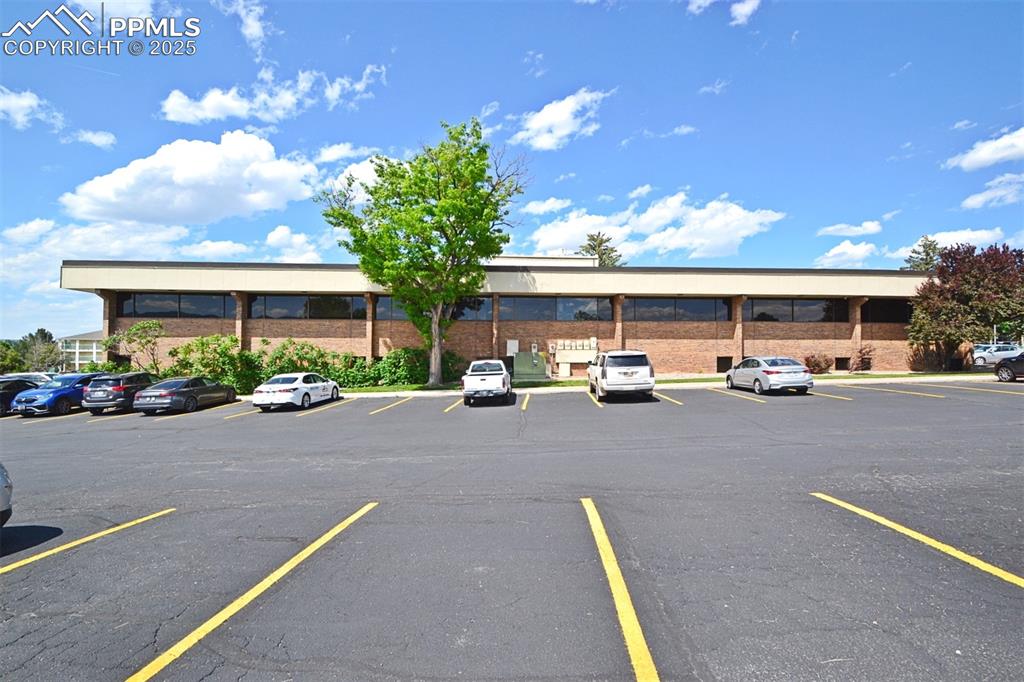 Image 15 of 16: View of uncovered parking lot