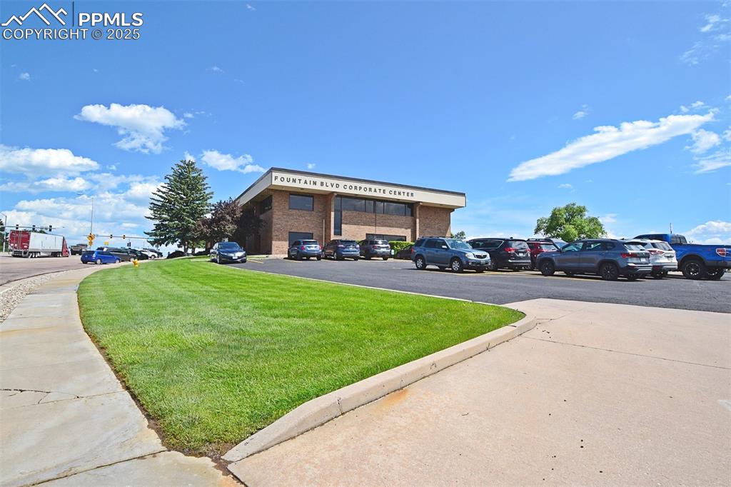 Image 4 of 16: View of property featuring uncovered parking