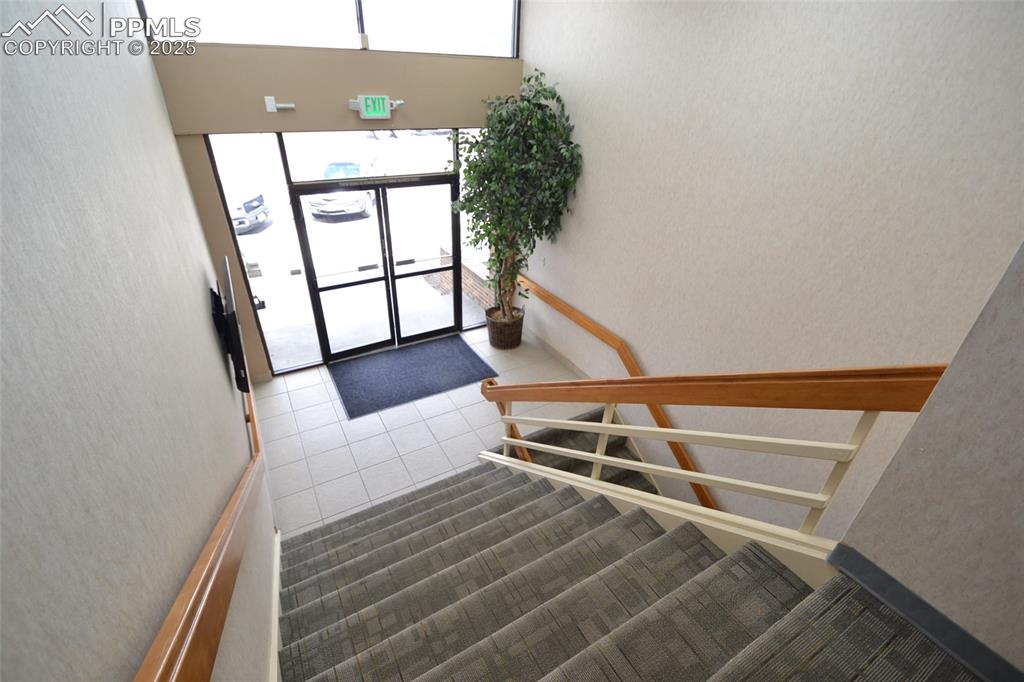 Image 6 of 16: Entryway with tile patterned flooring
