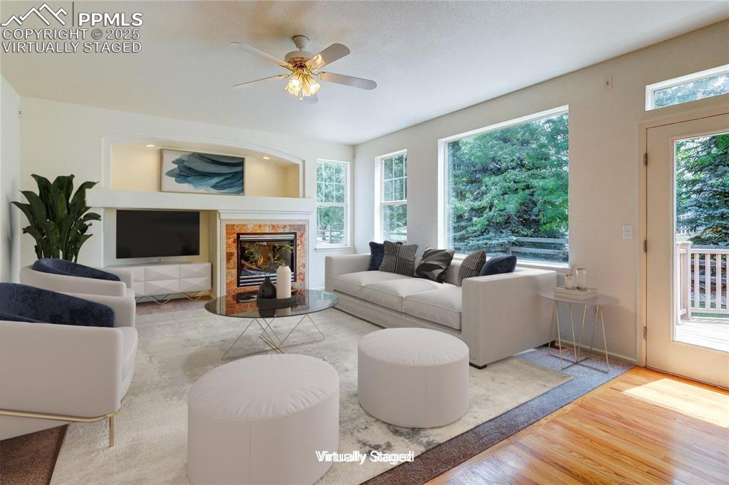 Image 13 of 50: family room virtually staged