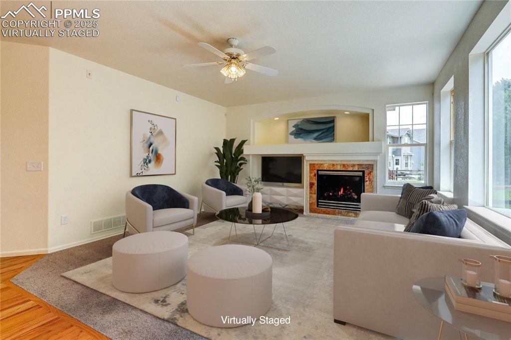Image 15 of 50: family room virtually staged