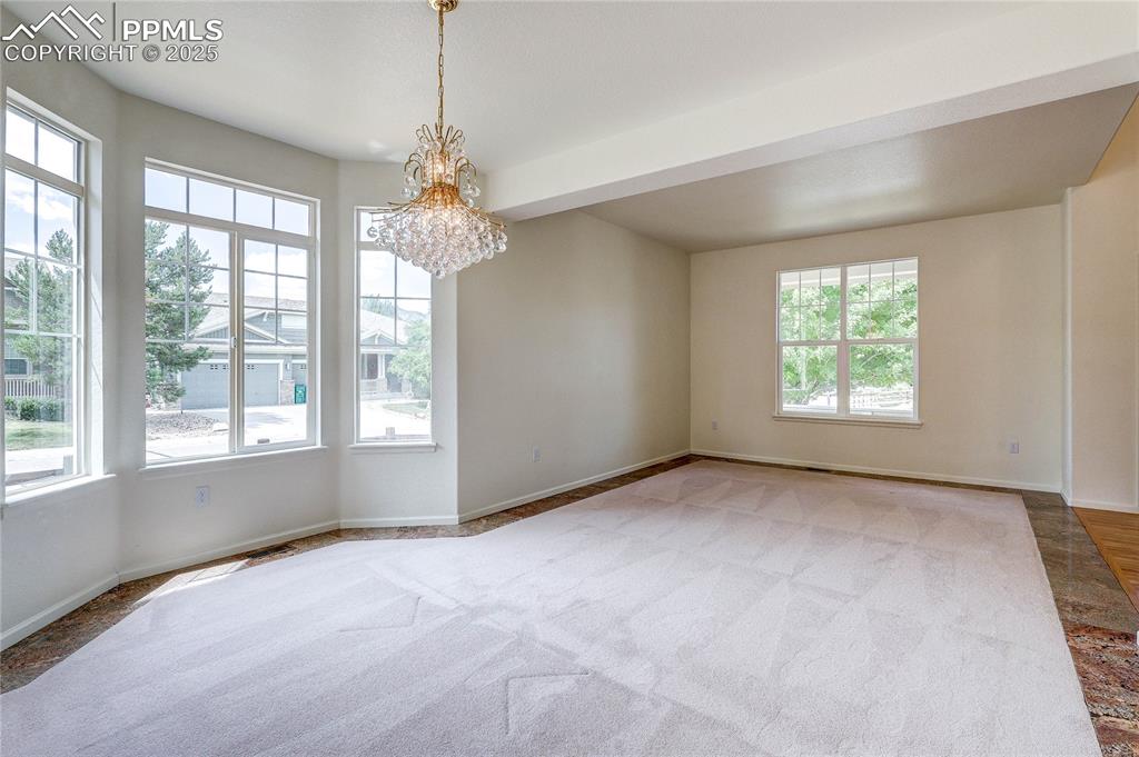 Image 7 of 50: combination formal living and dining room