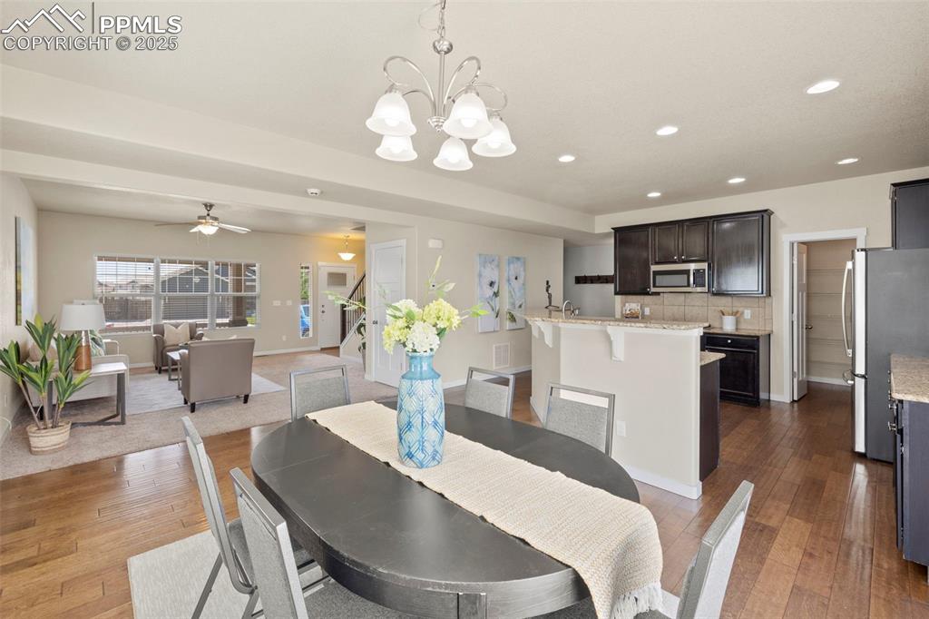 Image 10 of 31: Dining Area looking into kitchen 