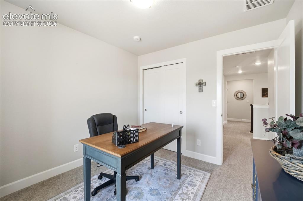 Image 24 of 33: Bedroom