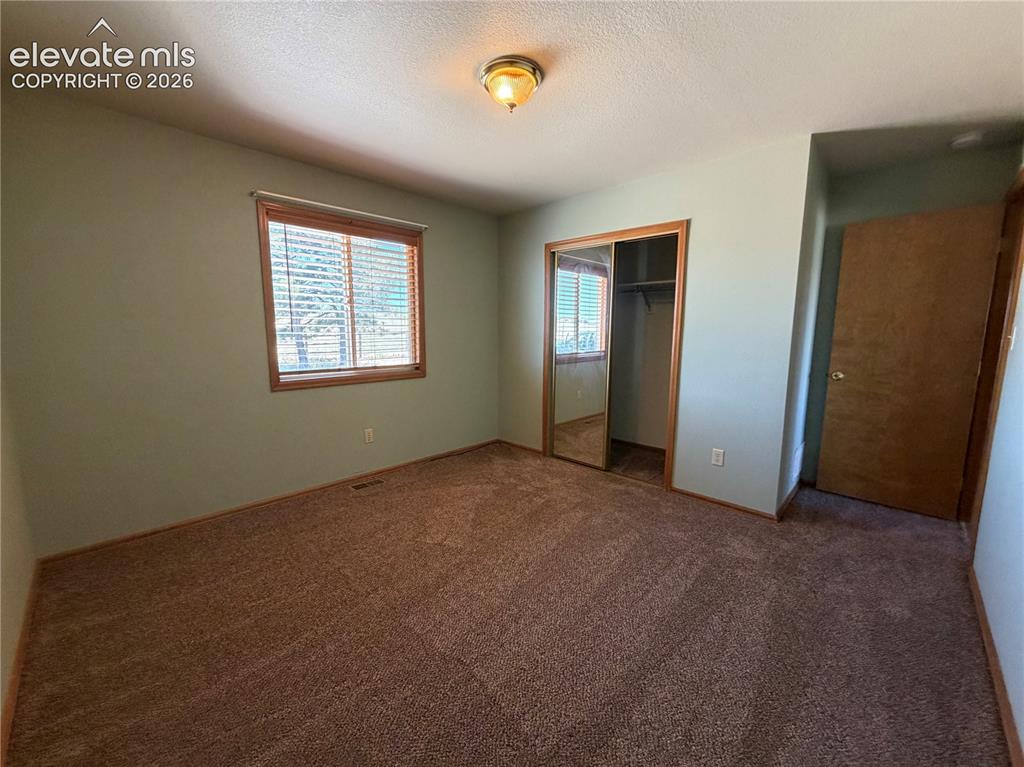 Image 13 of 21: Secondary Bedroom