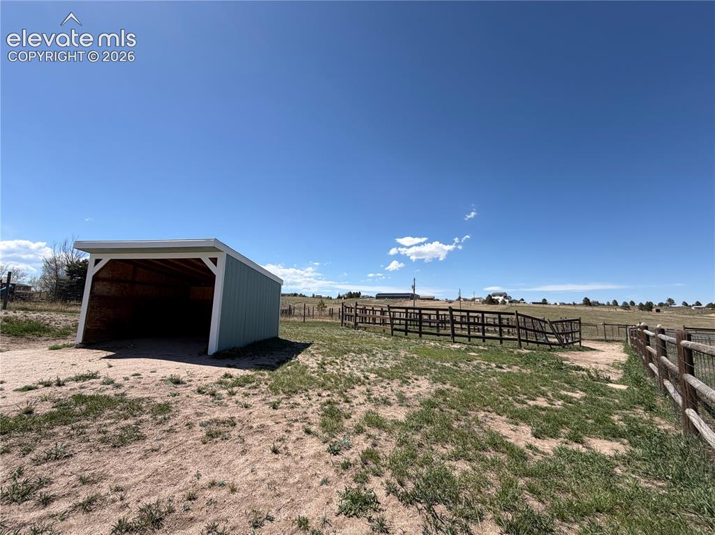 Image 21 of 21: Front Pasture Lean to and round pen