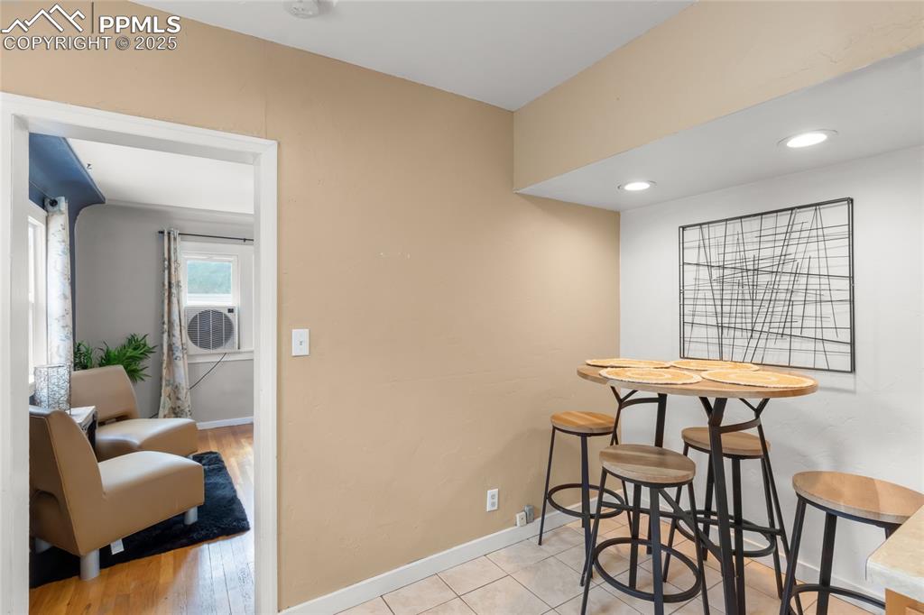 Image 12 of 39: Dining area featuring baseboards and recessed lighting