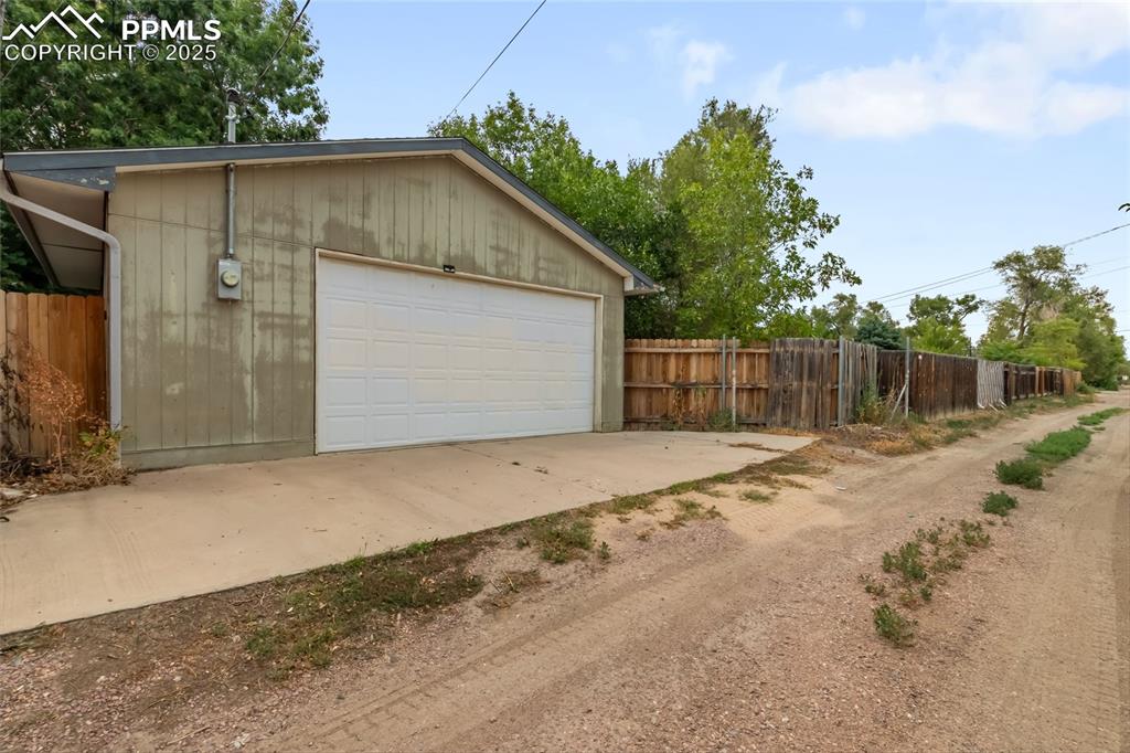 Image 32 of 39: View of detached garage from the alley