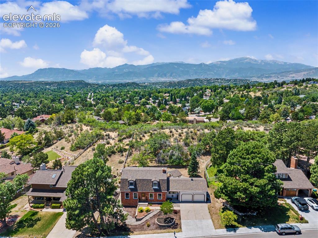 Image 1 of 49: Elevated Neighborhood & Mountain Views