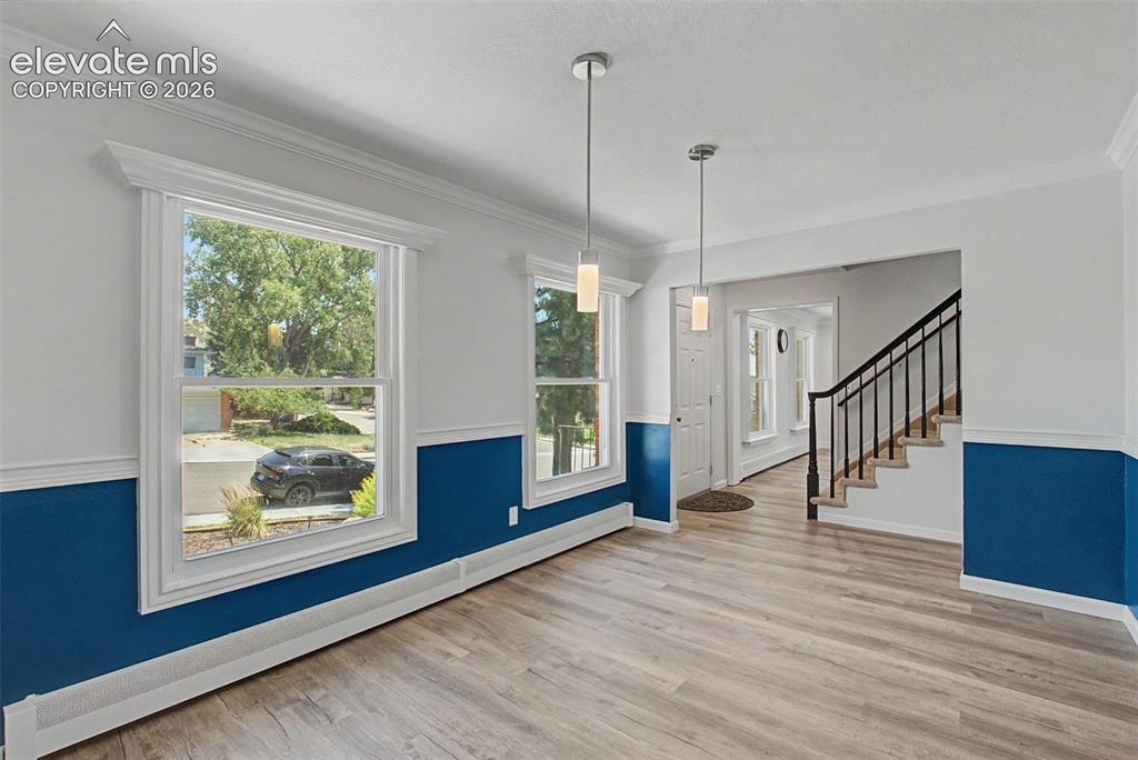 Image 14 of 49: Formal Dining Room with Great Natural Light