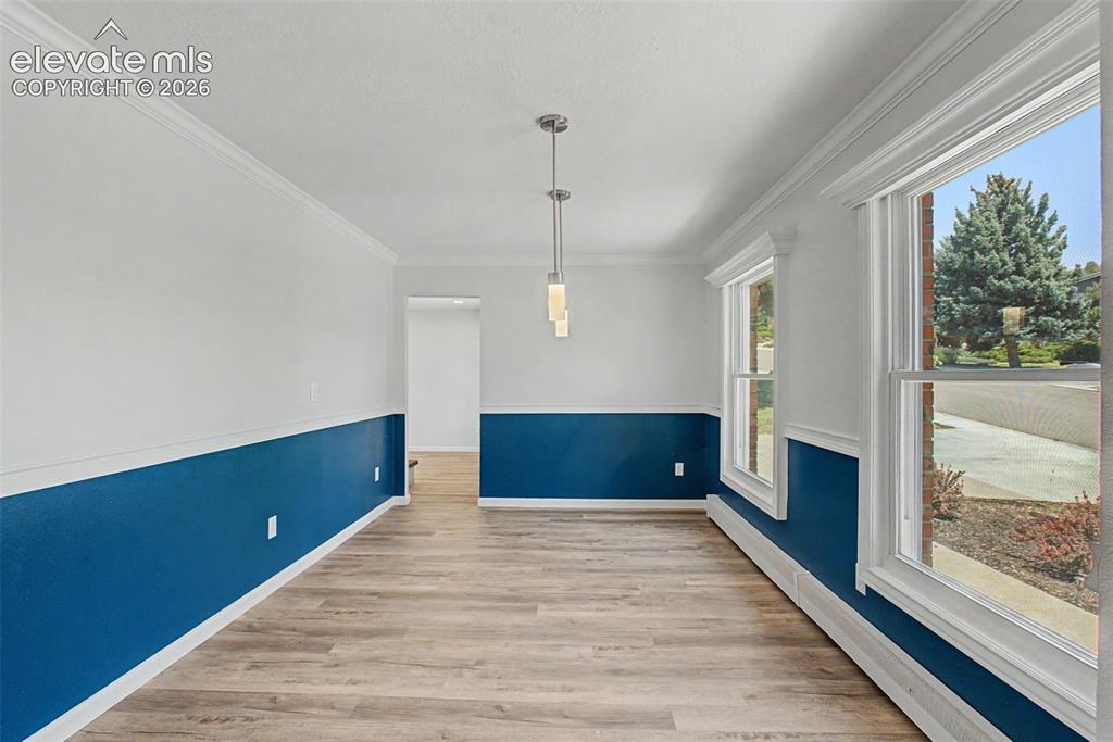 Image 15 of 49: Dining Room Open to Main Living Areas