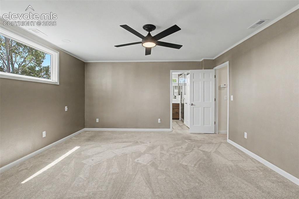 Image 22 of 49: Spacious Primary Bedroom