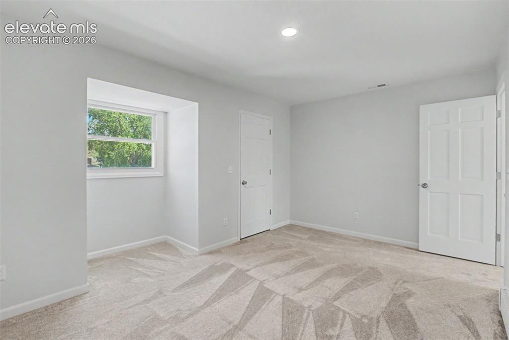 Image 30 of 49: Additional Bedroom with Natural Light