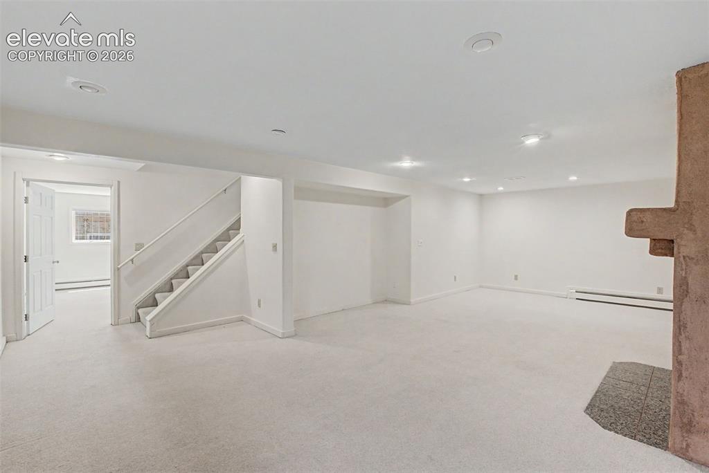Image 37 of 49: Spacious Lower-Level Family Room