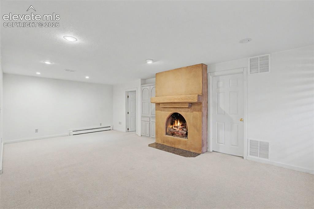 Image 38 of 49: Flexible Lower-Level Living Space