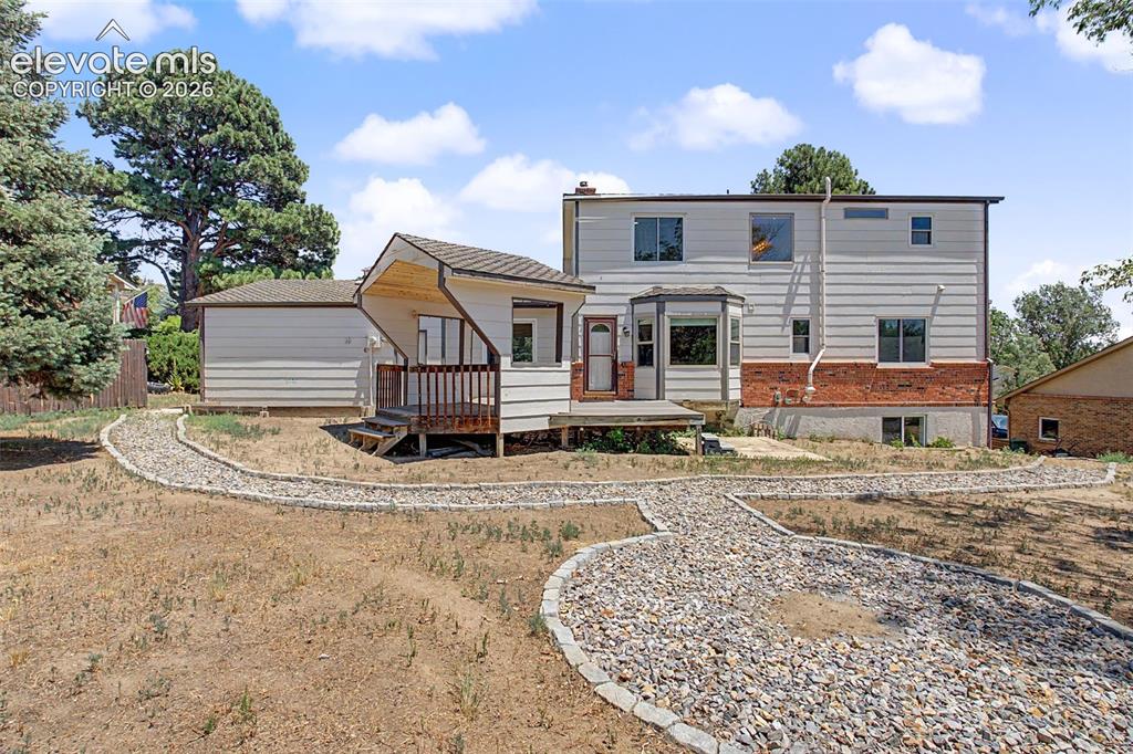 Image 40 of 49: Rear Exterior & Backyard