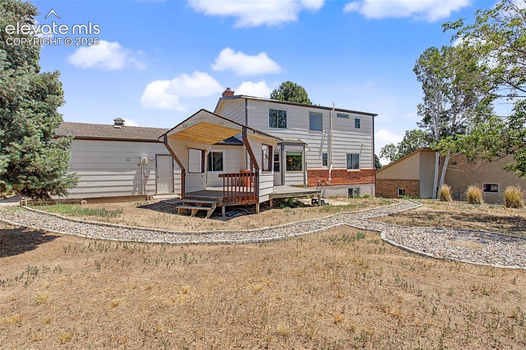 Image 41 of 49: Spacious Backyard & Rear Exterior