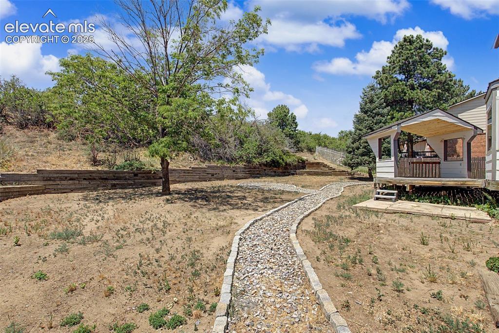Image 42 of 49: Large Backyard with Mature Trees