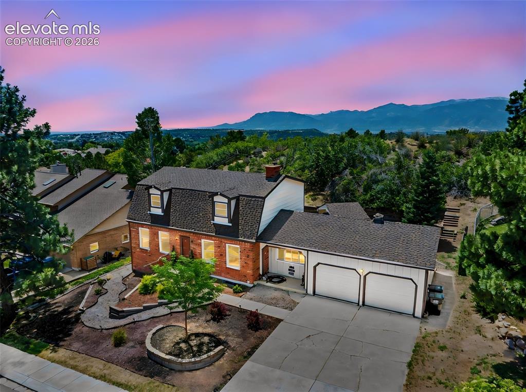 Image 5 of 49: Twilight Exterior View