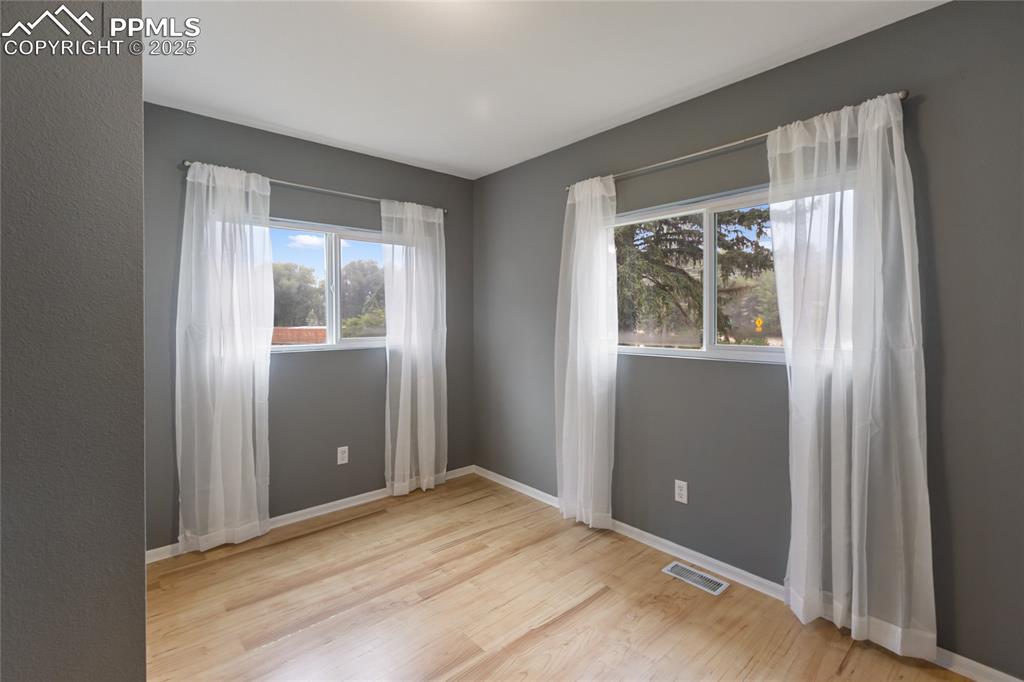 Image 15 of 27: And this is one of two spacious bedrooms