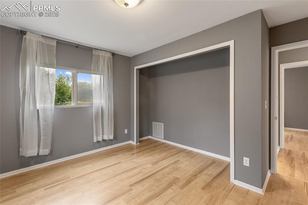 Image 18 of 27: Now the second of two bedrooms