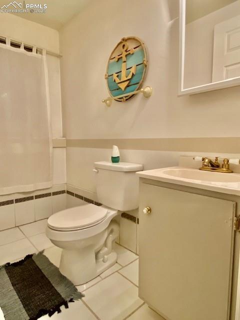 Image 24 of 28: Powder Room lower level