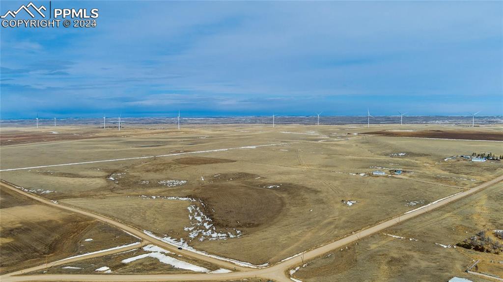 Image 2 of 14: Birds eye view of property with a rural view