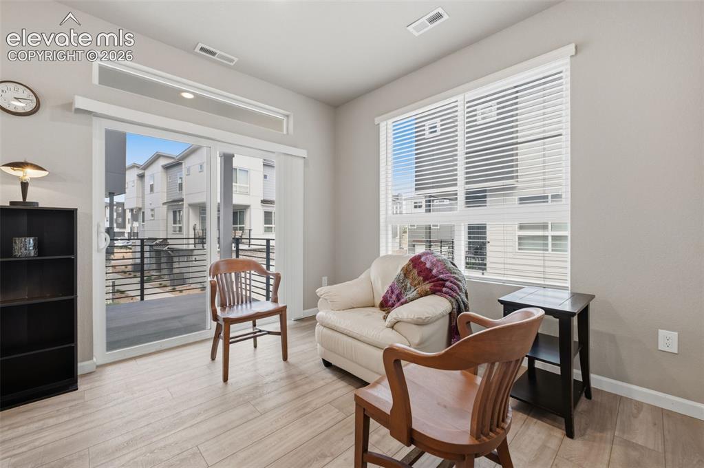 Image 16 of 24: Sliding glass door to balcony